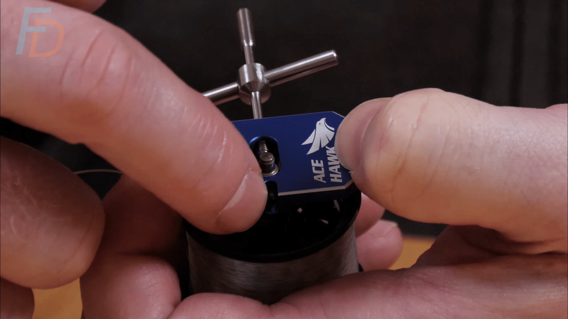 Baitcasting reel spool shaft pin removing tool