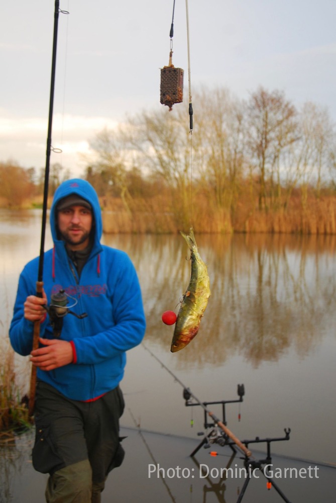 Ready to launch a large deadbait with a suitable pike rod and reel setup